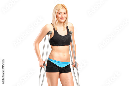 Photo: An injured young female on crutches An injured young female on crutches