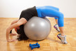 Attractive brunette doing some fitness exercises