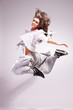 woman dancer smiling and jumping