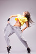 woman dancer in a full of energy dance pose