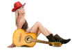 The beautiful girl in a cowboy's hat isolated