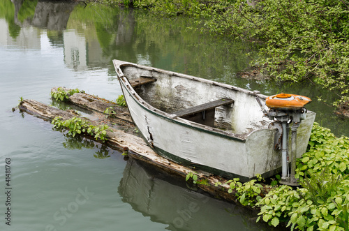 Foto: Skiff with outboard motor Skiff with outboard motor