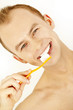 Young man brushing his teeth Young man brushing his teeth
