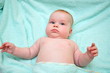 Five-month baby in a towel