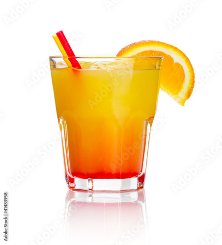 Photo: Orange alcohol cocktail with orange fruit slice isolated Orange alcohol cocktail with orange fruit slice isolated