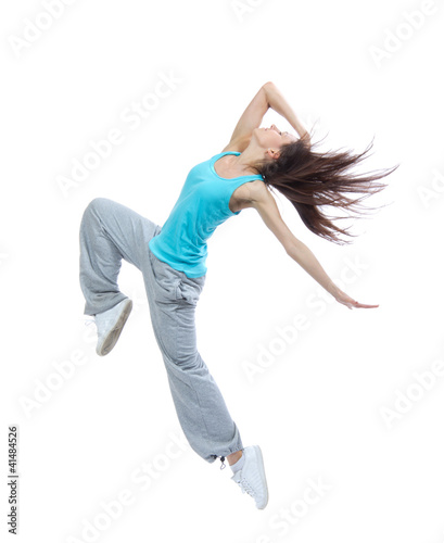 Photo: Teenage girl dancer dancing hip-hop Teenage girl dancer dancing hip-hop