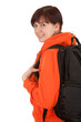 smiling student woman with backpack