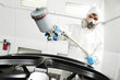 auto mechanic painting car bumper auto mechanic painting car bumper