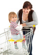 Foto: baby son in trolley with mother taking shopping baby son in trolley with mother taking shopping
