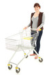 Foto: happy young woman with shopping trolley, full length happy young woman with shopping trolley, full length
