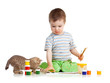 kid drawing paints with cat