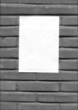vintage look white empty street poster on brick wall vintage look white empty street poster on brick wall