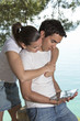 Foto: Young happy couple with new tablet Young happy couple with new tablet
