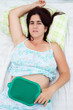 Woman suffering from uterine or abdominal pain