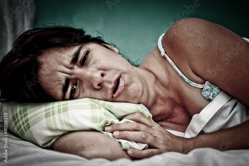 Photo: Grunge portrait of sick woman Grunge portrait of sick woman