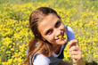Girl on the nature of a flowered Girl on the nature of a flowered
