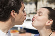 Foto: Young couple preparing for a big kiss- duck faces Young couple preparing for a big kiss- duck faces