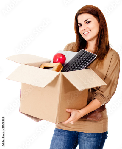 Photo: Woman moving house Woman moving house