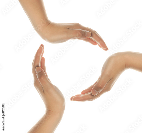 Photo: Recycling symbol made from hands isolated on white Recycling symbol made from hands isolated on white