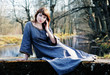 Photo: Young beautiful woman in vintage dress Young beautiful woman in vintage dress