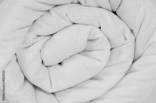 Photo: Rolled up duvet. Rolled up duvet.