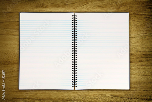 Photo: blank notepad on desk blank notepad on desk