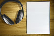 notebook and headphones