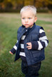 Young boy outdoors in nature.