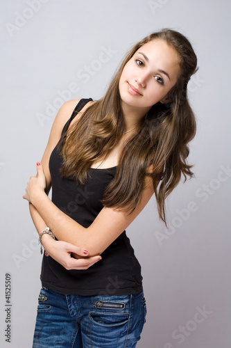 Photo: Slender young jeans model. Slender young jeans model.