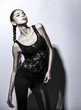 Photo: Young brunette lady in black dress Young brunette lady in black dress