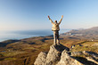 Man on the top of the mountain