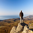 Man on the top of the mountain