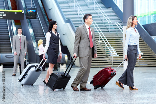 Photo: Group of business people at the airport. Group of business people at the airport.