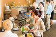 Foto: At the cafeteria woman pay bill At the cafeteria woman pay bill