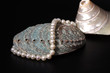 Photo: shells and a string of pearls shells and a string of pearls