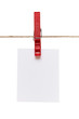 clothes peg and note paper on clothes line rope