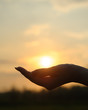 The sun in hand
