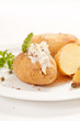 Baked potato filled with soft cheese Baked potato filled with soft cheese