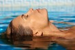 Young woman in swimming pool Young woman in swimming pool