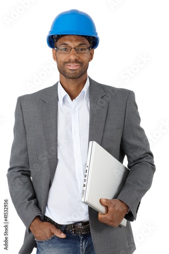 Photo: Elegant engineer with laptop Elegant engineer with laptop
