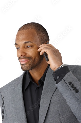 Photo: Businessman on mobile phone call Businessman on mobile phone call