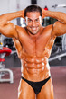 happy male bodybuilder in gym
