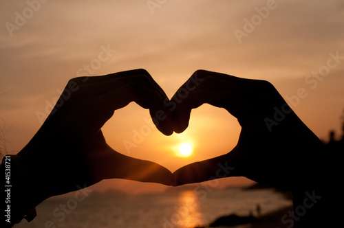 Photo: Silhouette Heart from hand Silhouette Heart from hand
