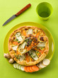 vegetables cake over dish on green background vegetables cake over dish on green background