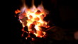 Blacksmith at work, melting iron in a small furnace