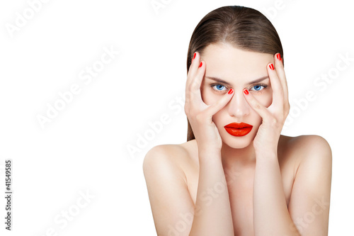 Photo: Beautiful fashion portrait of female face with red lips Beautiful fashion portrait of female face with red lips