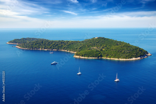 Photo: Picturesque seascape with cruise yachts. Dubrovnik, Croatia Picturesque seascape with cruise yachts. Dubrovnik, Croatia