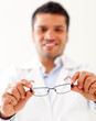 Man holding glasses