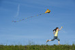 happy girl flying her kite