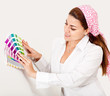 Woman painting a wall